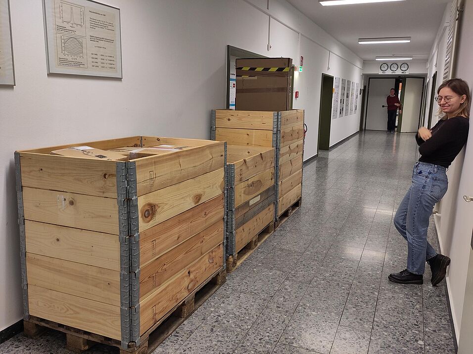 Several boxes filled with lab equipment.